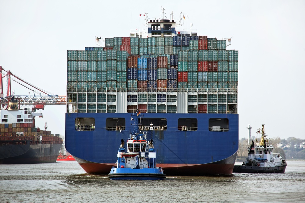 Cargo ship with containers at the port of hamburg